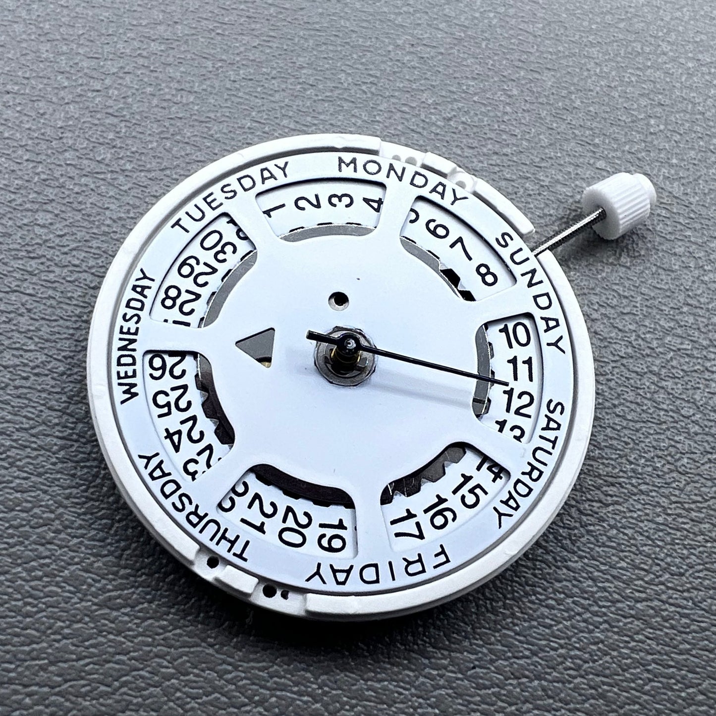 Swiss ISA 1198 watch movement with day-date feature, white dial, date at 3 o?clock.