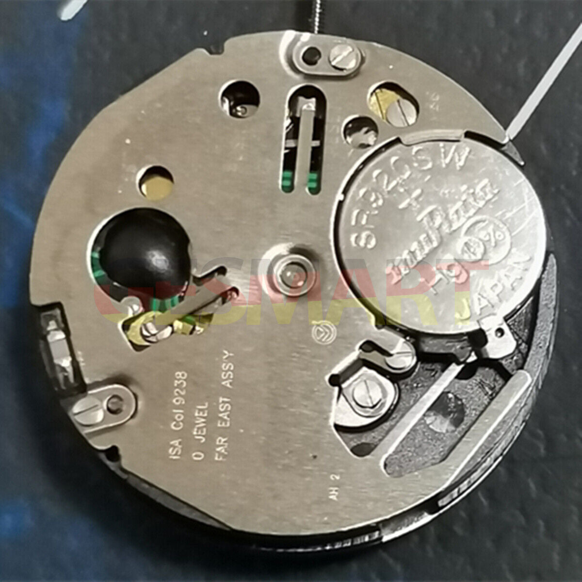 Watchmakers ISA 9238 silver quartz watch movement replacement part for repair.