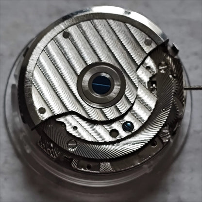 Wenzhou mechanical watch with big date at 12 and bare balance wheel at 6, China Made craftsmanship