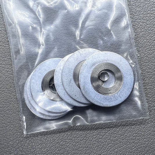 Silver mainspring set for movement 7009#180, generic fit, 5 pieces for precise watch repair.