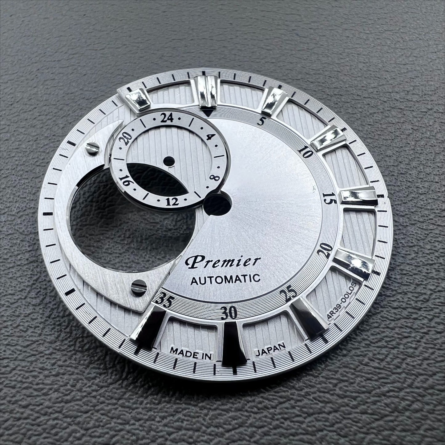 Silver 28.5mm modified hollow diving watch dial for NH39, sleek design.