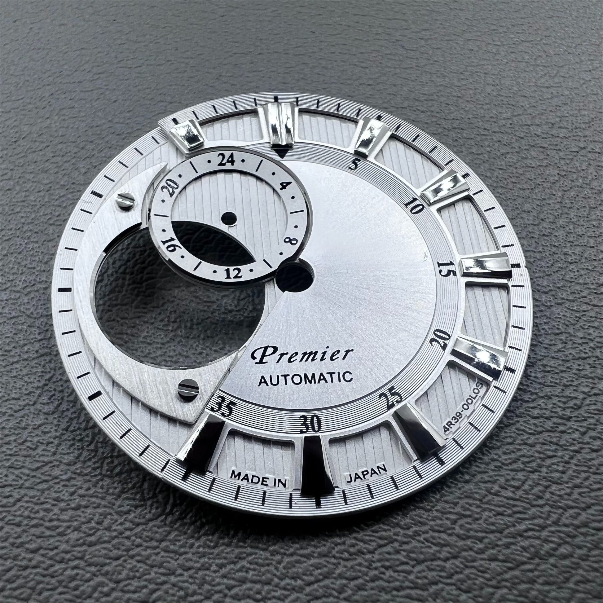 Silver 28.5mm modified hollow diving watch dial for NH39, sleek design.