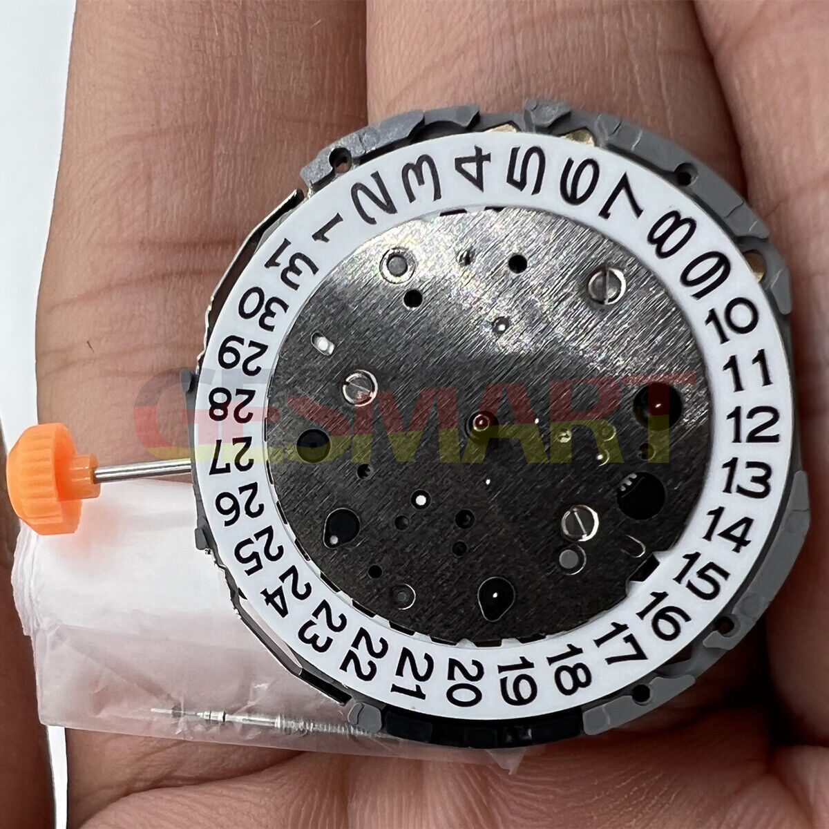 Miyota JS15 Japan Quartz watch movement with small seconds at 6, 9, and 12 o'clock, date at 6.