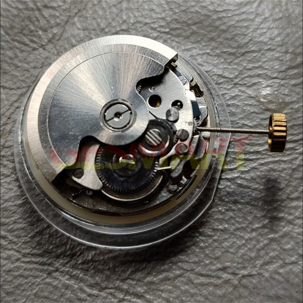 China Made HZ2350 automatic watch movement showing double calendar function and precise mechanical details.