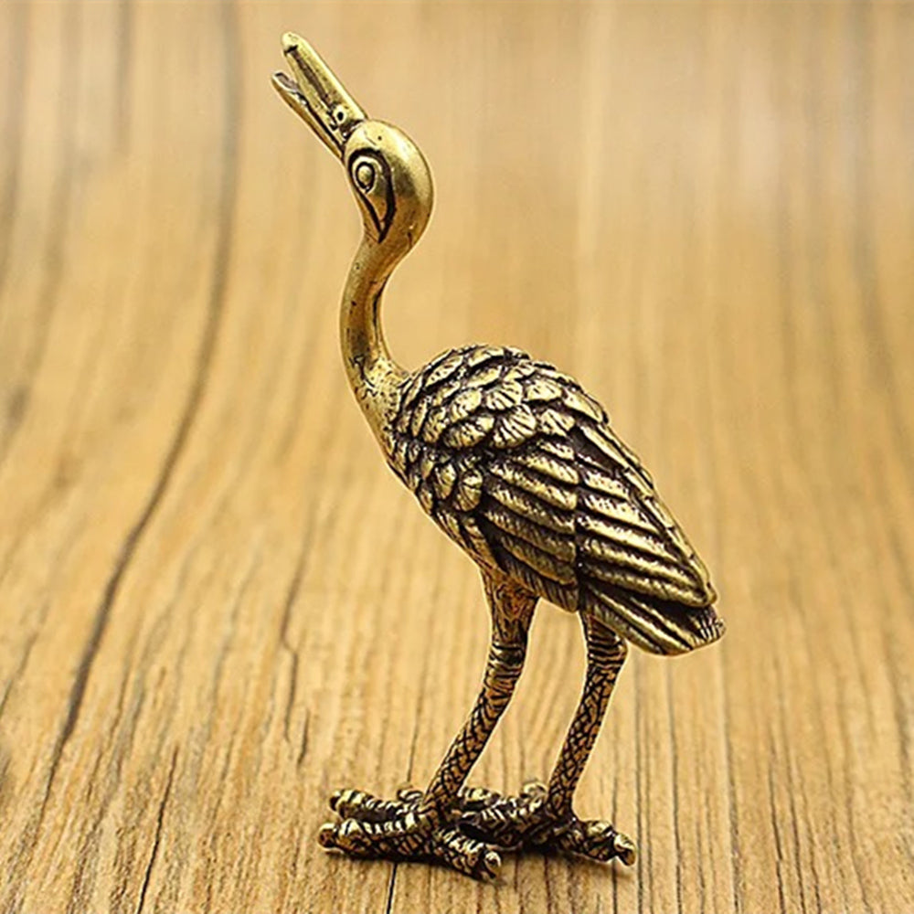 Hand-carved vintage solid copper crane figurine, elegant bronze decor trinket for home display.