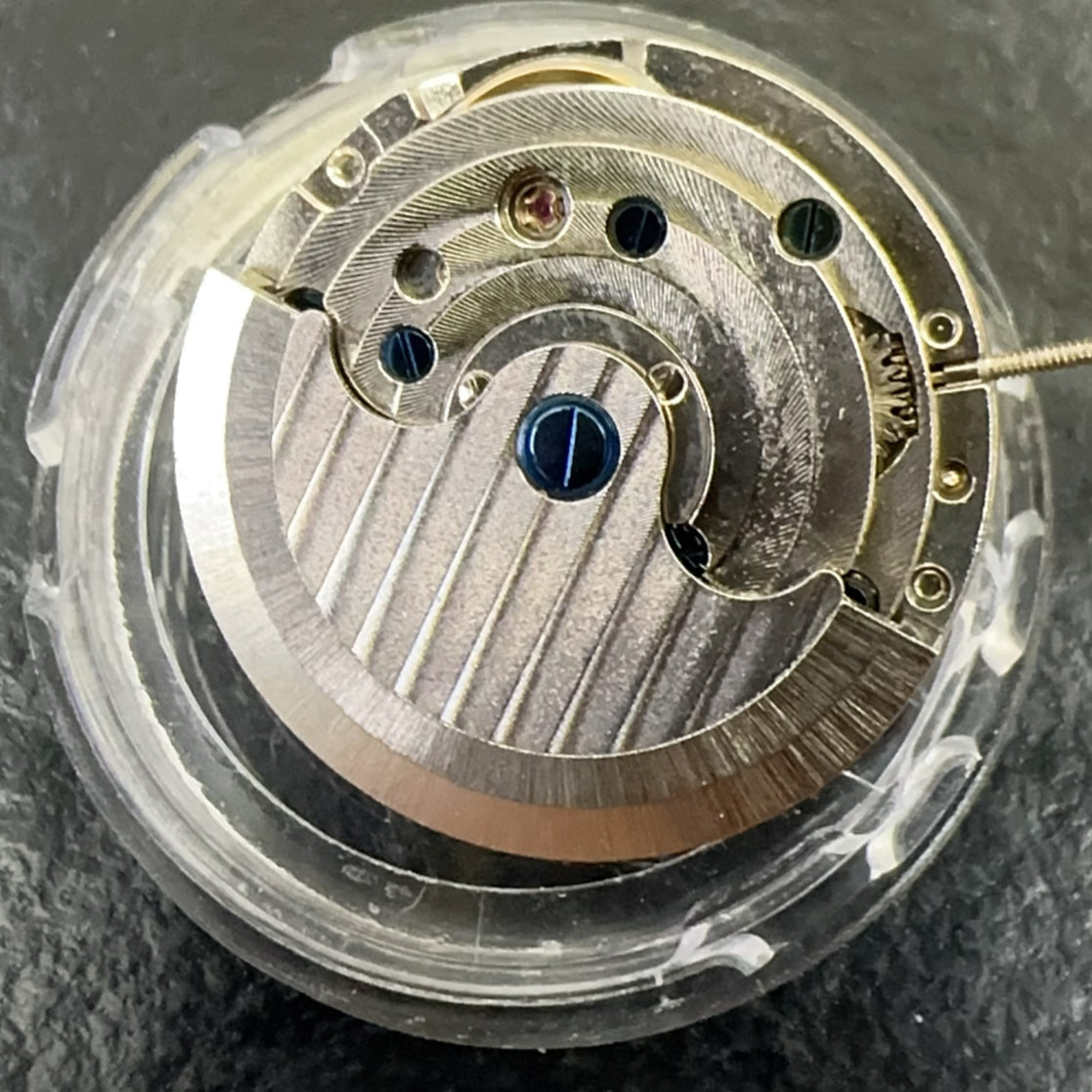 Chinese Silver Lady watch accessory featuring automatic mechanical movement, 3 hands, and bare balance wheel at 6 o'clock.