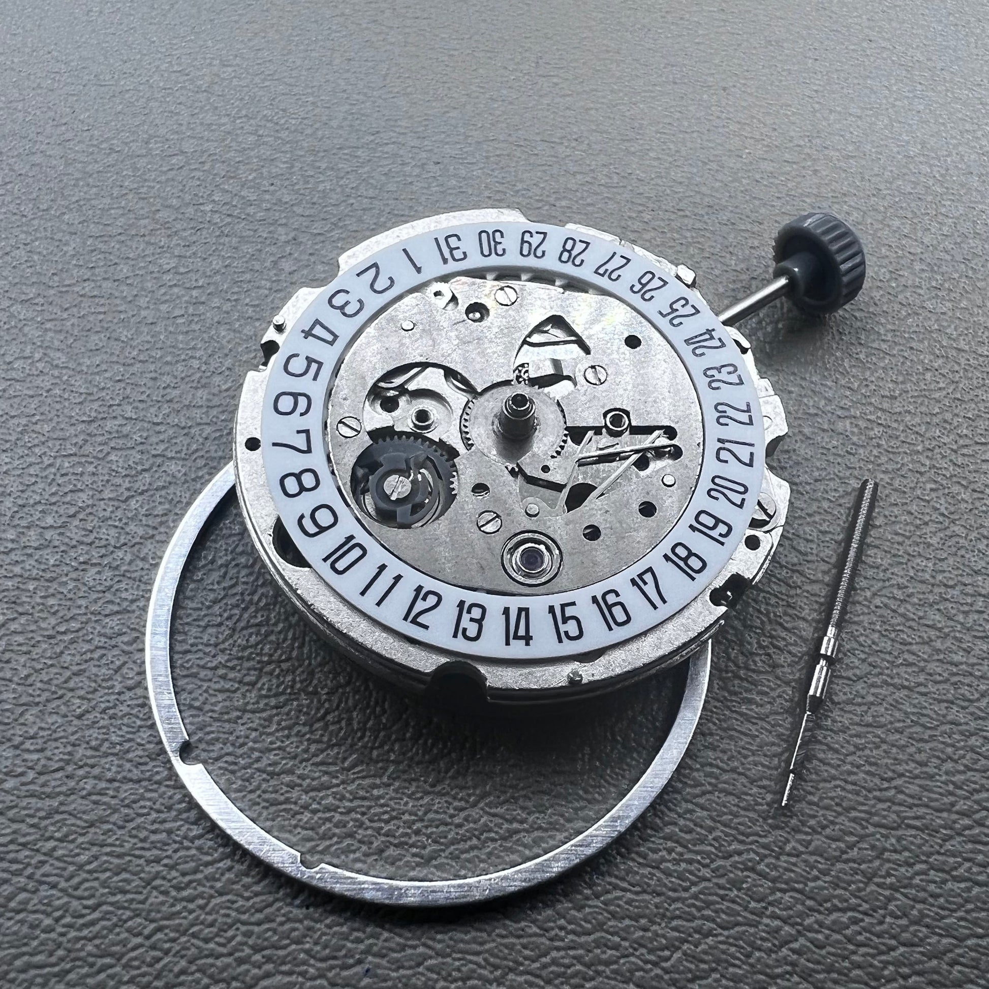 Japan Miyota 8215 watch movement with white dial, automatic mechanical, date display at 6 o'clock by Miyota.