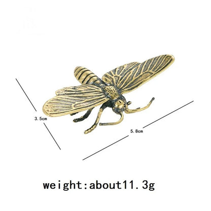 Vintage solid copper dragonfly trinket featuring hand-carved bronze details, ideal for watch accessory display.