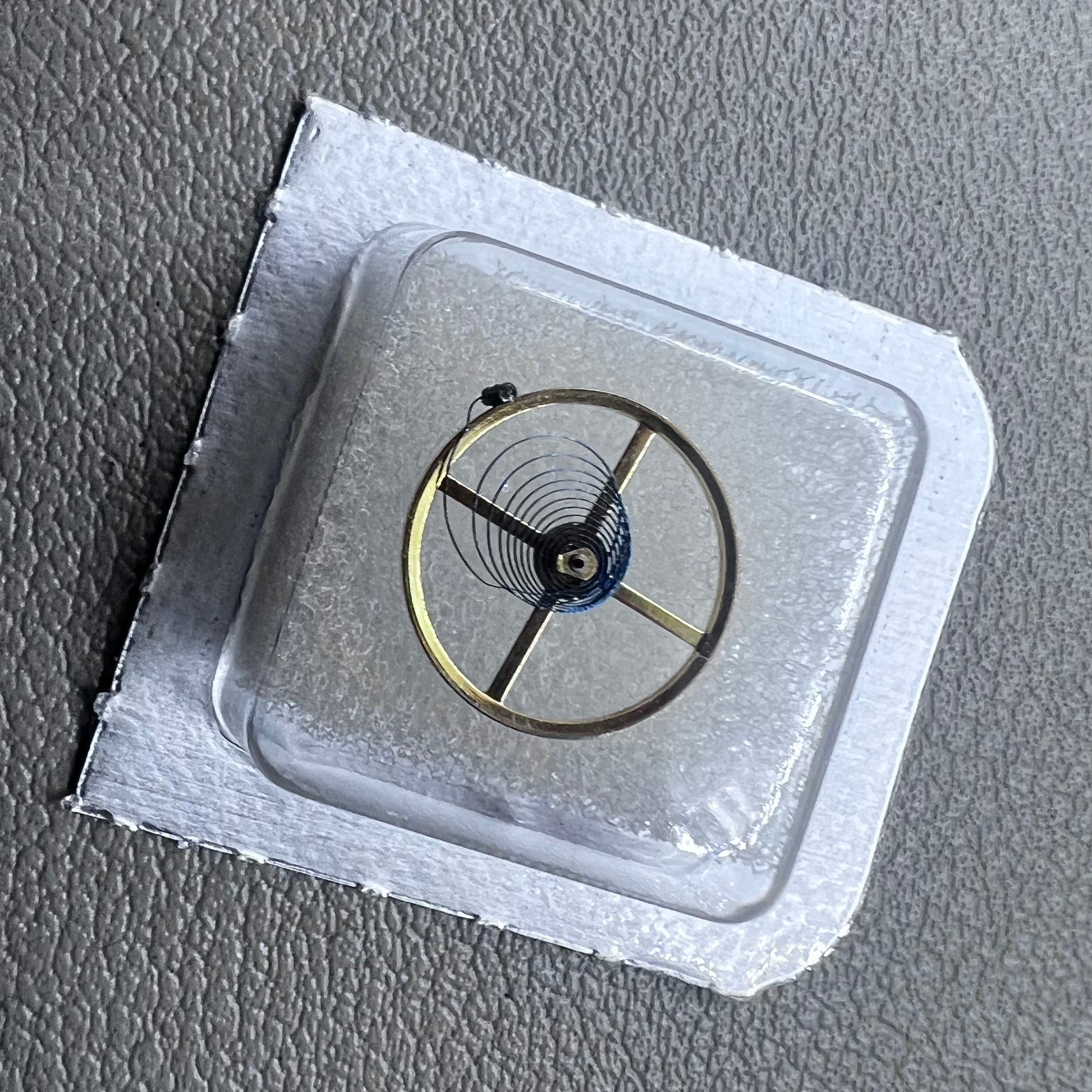 Complete balance wheel with blue hairspring for China Made 3135 3186 movement, precision watch accessory.