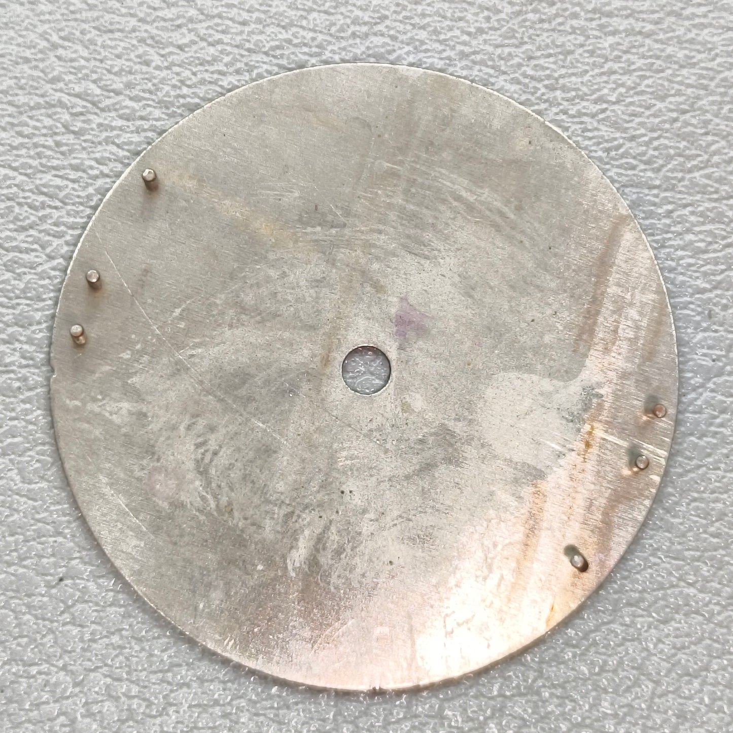 watch dial with S logo