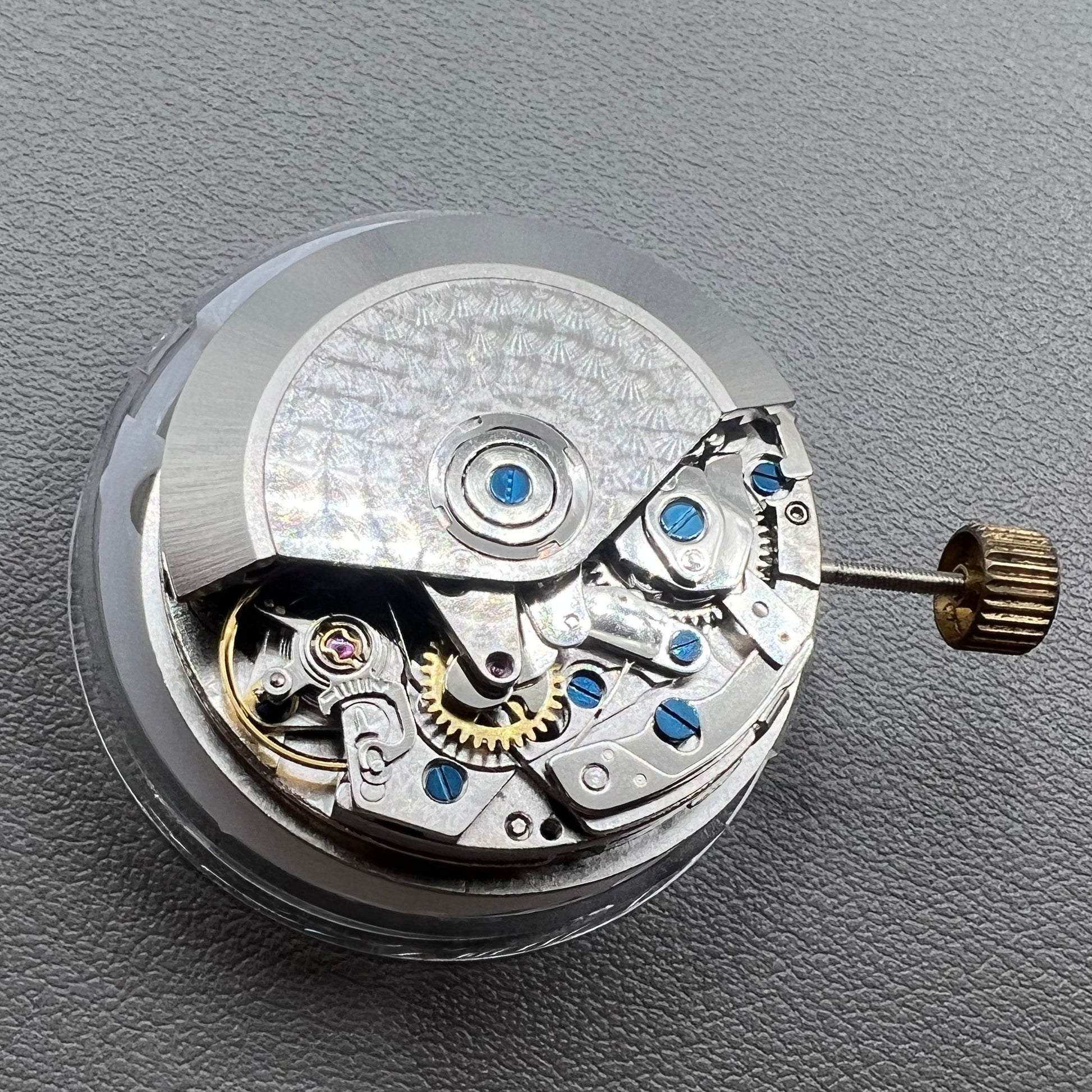 China 7750 automatic chronograph movement with date, day, and small second at 9 o'clock for watch accessories.