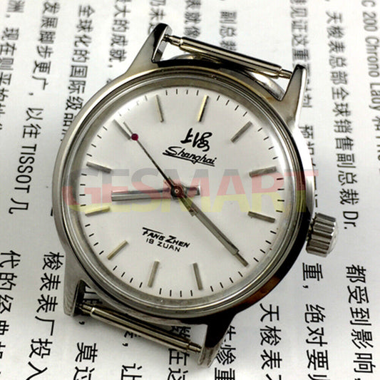 32mm Shanghai Factory manual mechanical watch with silver case and silver nail hands, classic style.