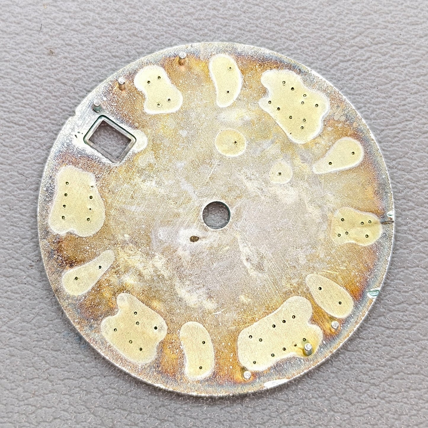watch dial with S logo