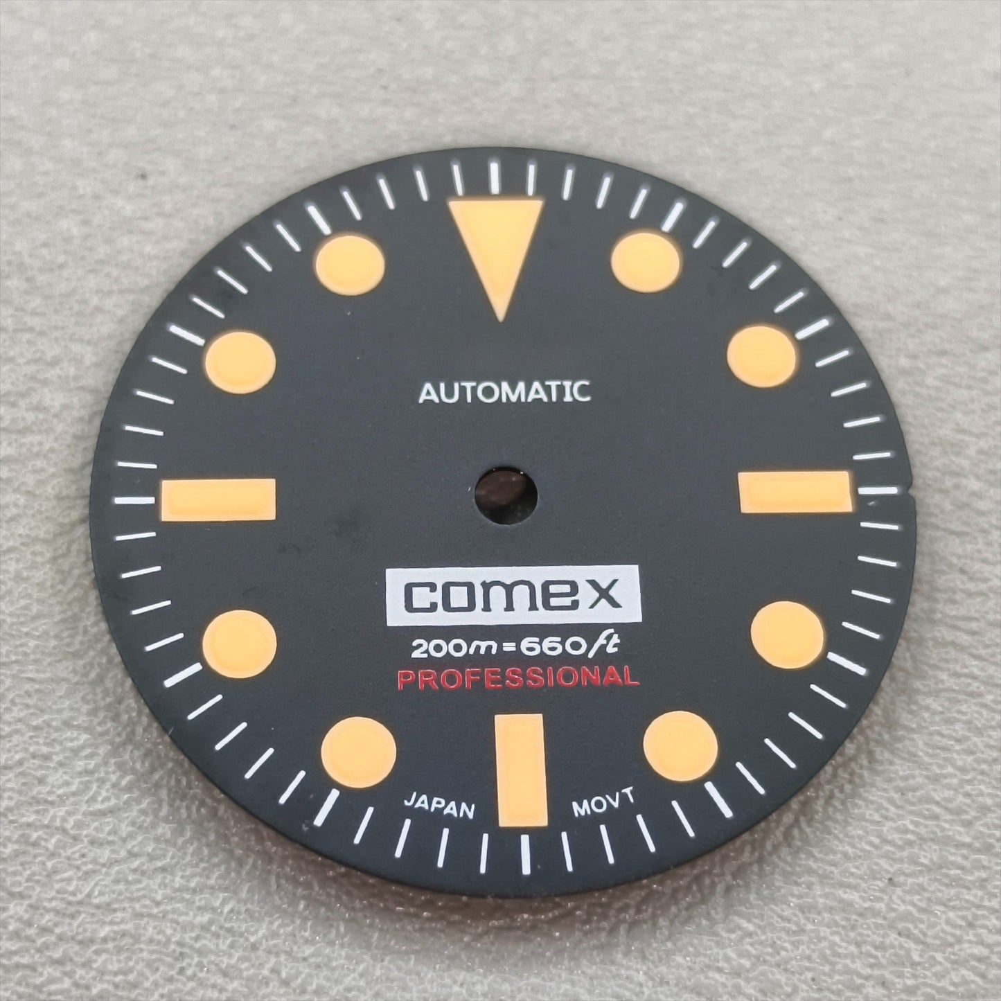 watch dial with S logo
