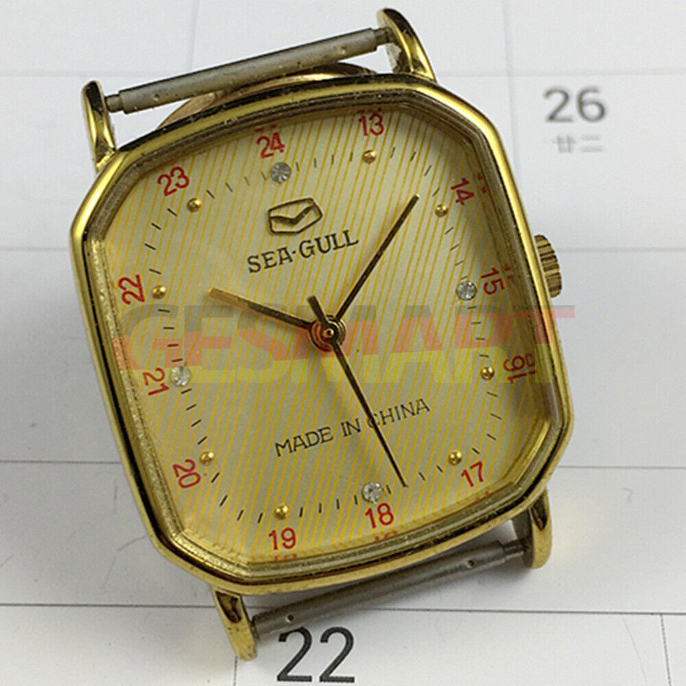Tianjin Seagull 28mm octagonal gold watch with golden dial, manual mechanical movement, elegant accessory