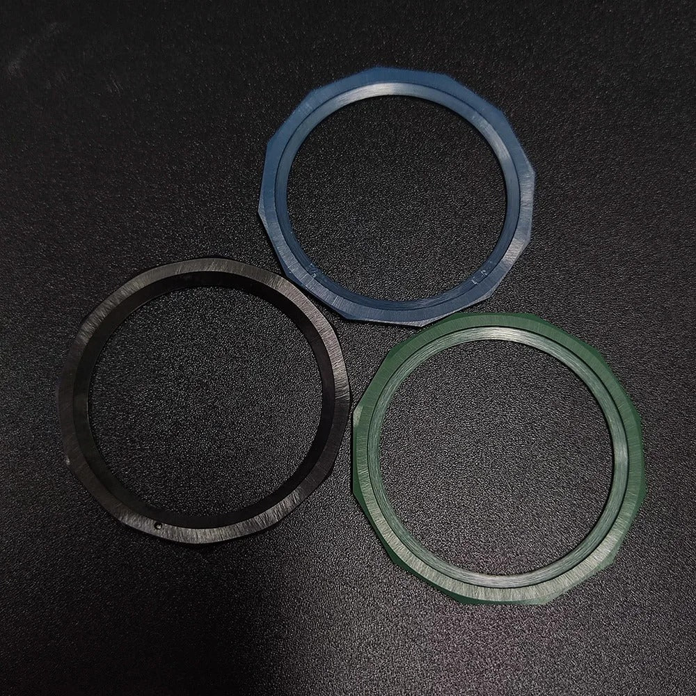 Sloping luminous ceramic bezel insert 42.3x33.3mm for automatic watch replacement, precise fit and durability.