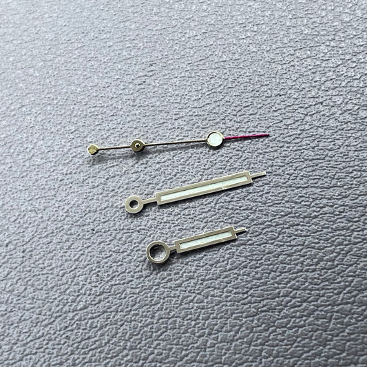Green luminous watch hands with golden trim for NH35 NH36 movements, enhancing visibility and style.
