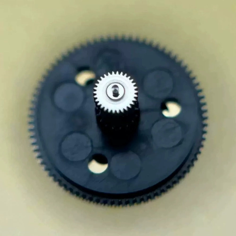 Black counting wheel for ETA C01.211 watch movement, precise replacement component for repairs.