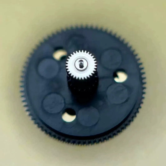 Black counting wheel for ETA C01.211 watch movement, precise replacement component for repairs.