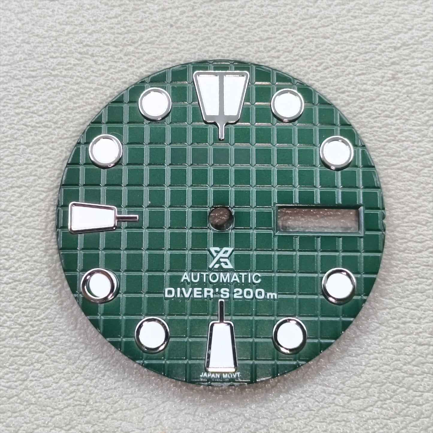 watch dial with S logo