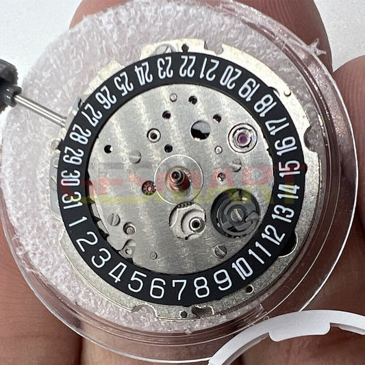 Miyota Citizen 8215 watch movement with black dial and date at 6, Japanese automatic mechanical design
