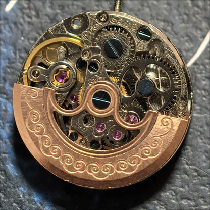 China Made Silver Hollow Mechanical Movement with Rose Golden Rotor Watch Part