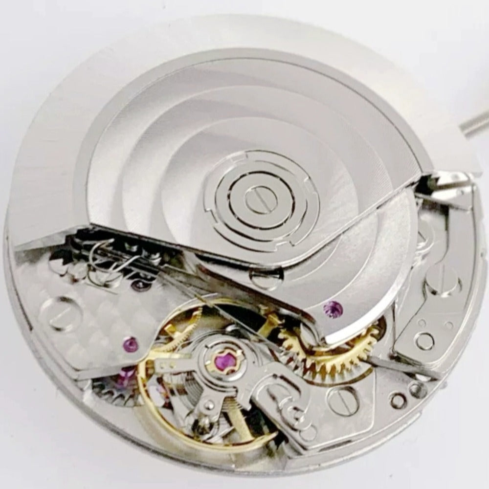 Chinese Dandong 7750 mechanical watch movement with 5 hands and ultra-thin small second at 6 o'clock.
