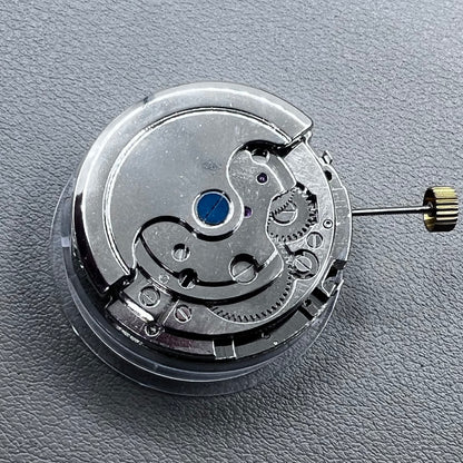 Silver Asian Dandong automatic watch with mechanical movement, date and week indicators, moon phase display.