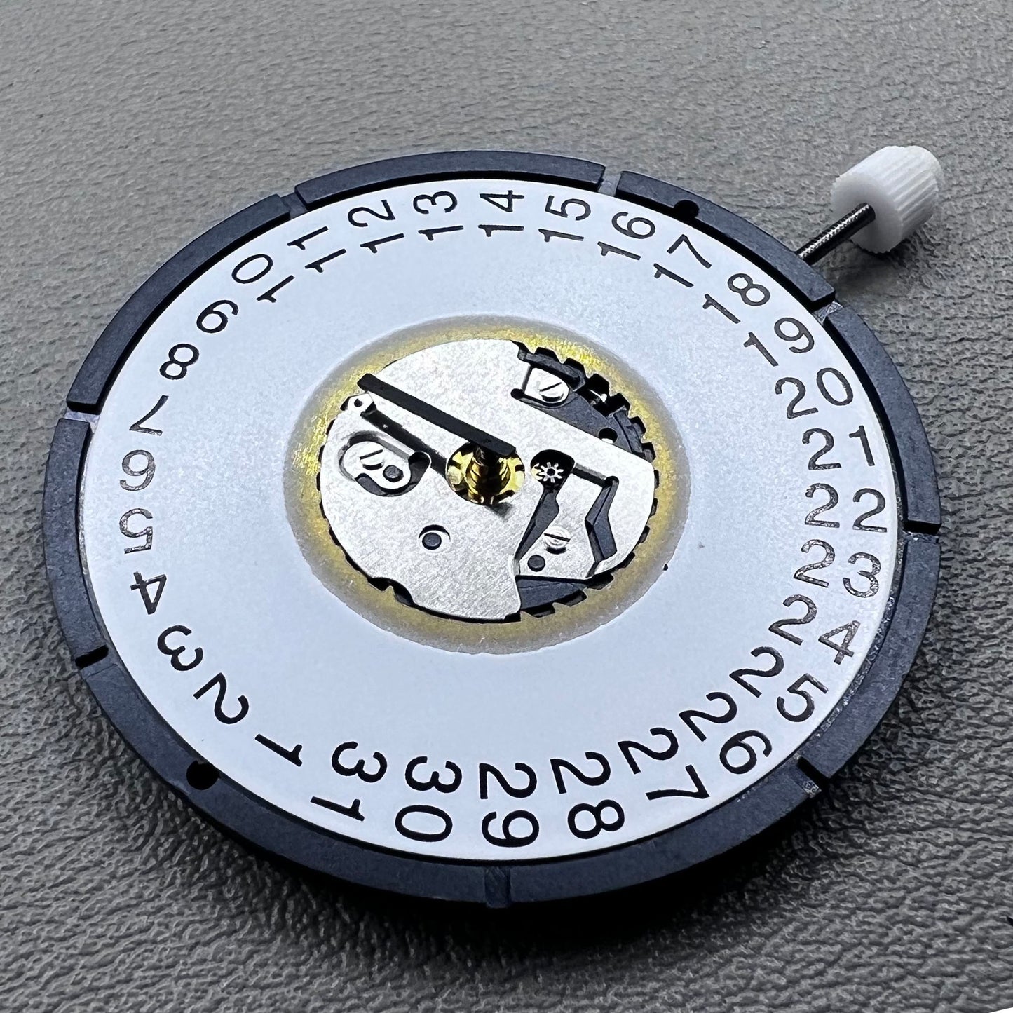 Swiss ISA 2334 quartz watch movement with date at 3 o?clock, precise timekeeping by Swiss ISA.