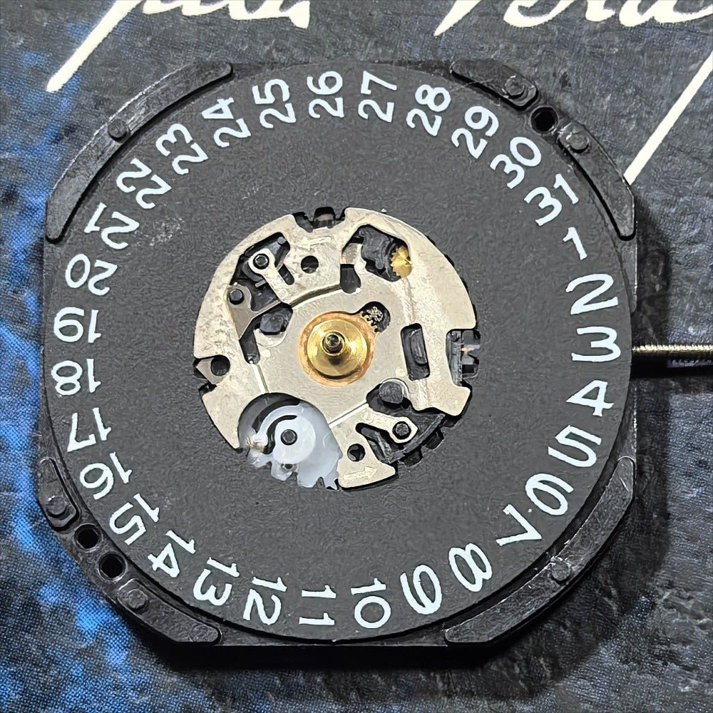 Epson VX42E watch movement with black dial, three hands, single calendar, Japan made Quartz