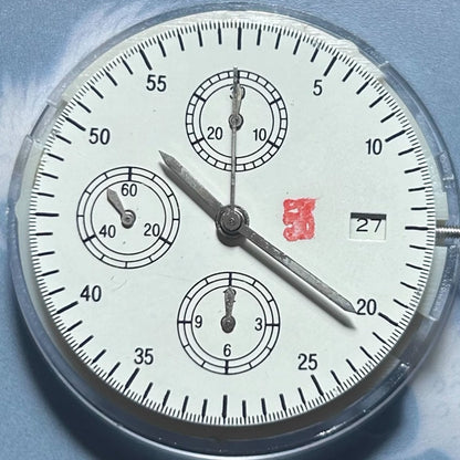 Dandong 7750 mechanical watch movement with small seconds at 6, 9, 12 and date at 3 features.