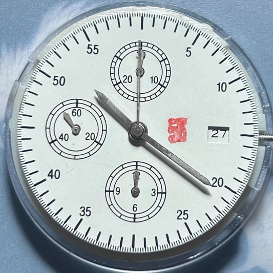 Dandong 7750 mechanical watch movement with small seconds at 6, 9, 12 and date at 3 features.