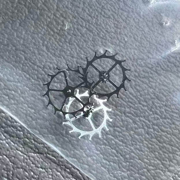 1. Escape wheel set for NH35 NH36 watch movement by brand, precision fit with 3 pieces included.  