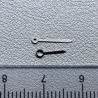 Set of 2 silver 10x7mm watch hands for Ronda 763/762/751/1062/1063 movements, perfect for repairs.