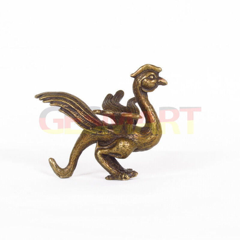 Hand-carved solid copper dragon figurine with detailed polished craftsmanship.