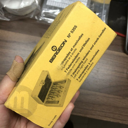 Bergeon 5355 watch mainspring winder set in wooden box, precision Swiss tool for watch repair and assembly.