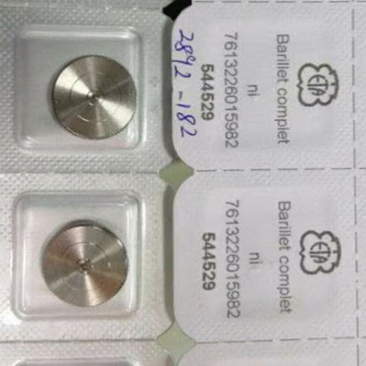 Complete barrel with new mainspring for ETA 2892 watch movement, essential spare part for repairs.