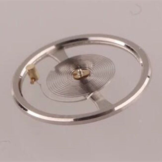 Asian watch balance wheel with hairspring for movement 7009, precision part for accurate timekeeping.