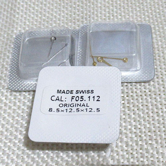 Silver watch hands set for F05.112 movement, includes hour, minute, and second hands.