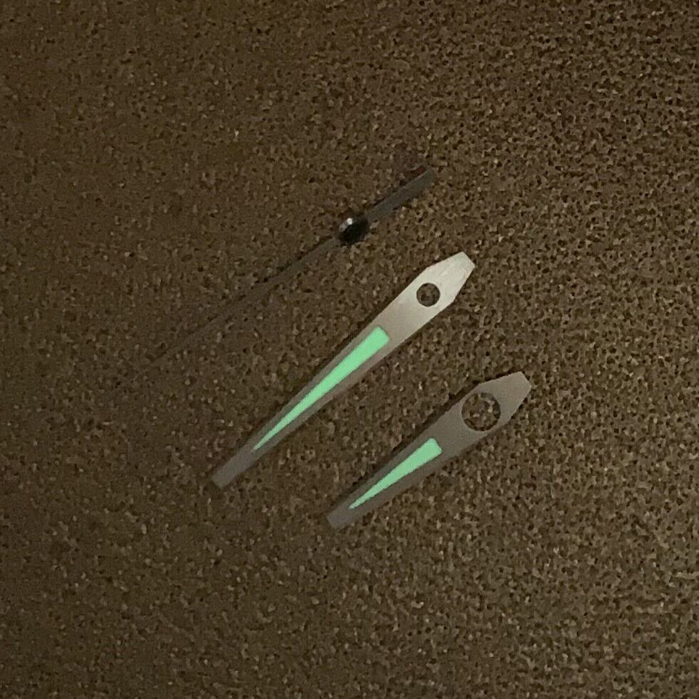 Green luminous lightning-style watch hands set designed for NH35 NH36 movement, ideal for custom watch repairs.