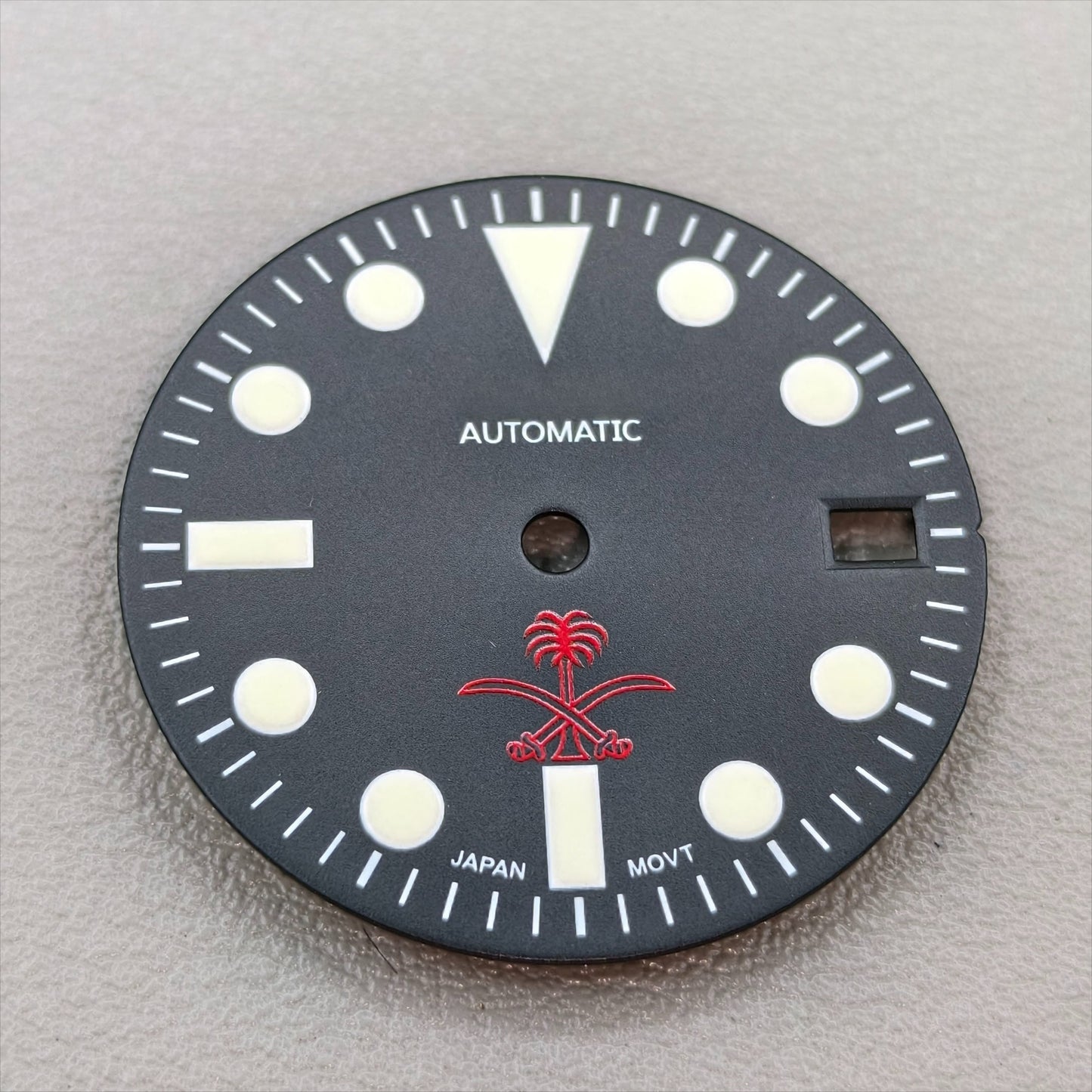 watch dial with S logo