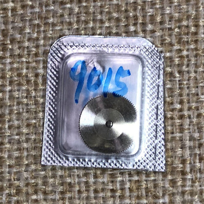 Complete barrel with mainspring for Miyota 9015 movement, generic fit replacement part for watch repair.