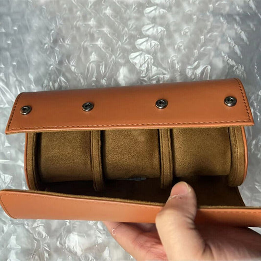 Brown leather travel watch case with 3 slots, portable organizer for watch protection on the go.