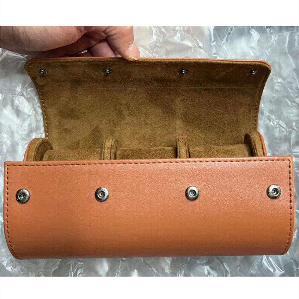 Brown leather travel watch case, with 3 slots for secure and stylish watch storage on the go.
