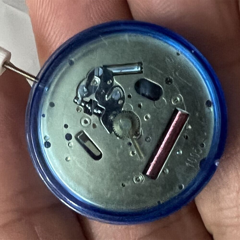 Golden ISA 220 quartz watch movement for repairs, brand replacement part without calendar feature.