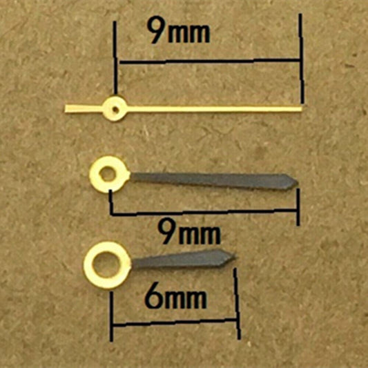 Black polished golden pointed watch hands compatible with Ronda 763 quartz movement, stylish and precise.