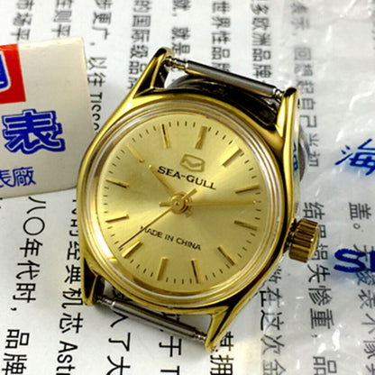 Seagull ladies' manual mechanical watch with golden dial, elegant design by Tianjin Factory for stylish wear.