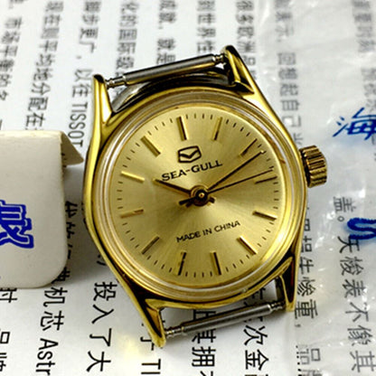 Seagull ladies' manual mechanical watch with golden dial, elegant design by Tianjin Factory for stylish wear.