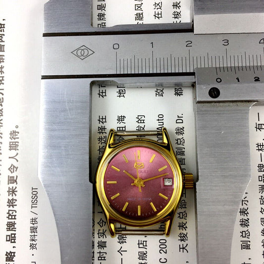 Purple dial ladies watch by Tianjin Seagull with gold accents, manual mechanical movement for elegant wear.