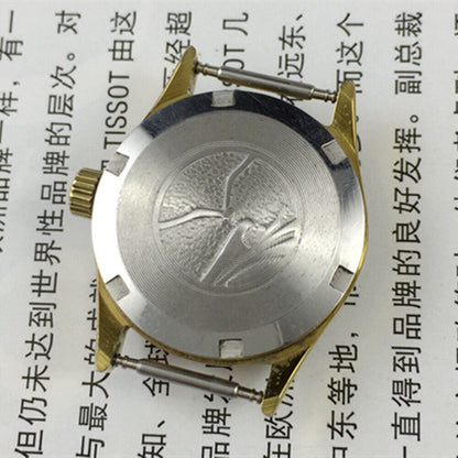Ladies round gold-tone watch with golden nail markers, manual mechanical movement by Tianjin Seagull, elegant design.